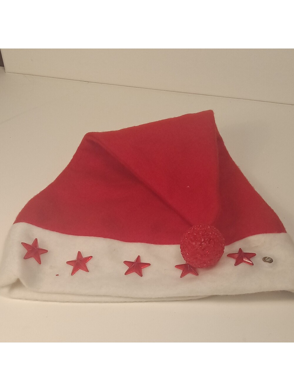 Red & White Santa Hat One Size Fabric Red Star and Pom Pom is plastic Adult